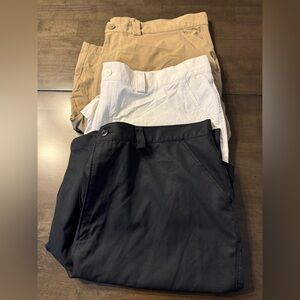3 pairs Under Armour Men's Black, White, and Tan shorts